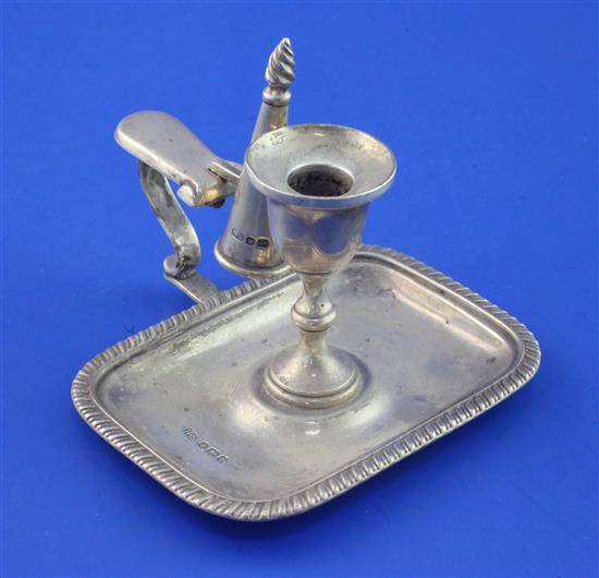 A late Victorian silver chamberstick and snuffer, 3.5 oz.